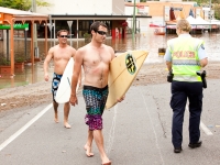 The surfers in the water at Rosalie, a bit sheepish in front of the onlooking crowd and having been told by the police about the contaminated water.